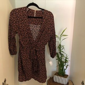 Plunge neck floral Romper from Free People (size M)